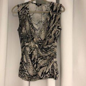 Grey/black snake print sleeveless tank with zipper accents. Cinches at waist.
